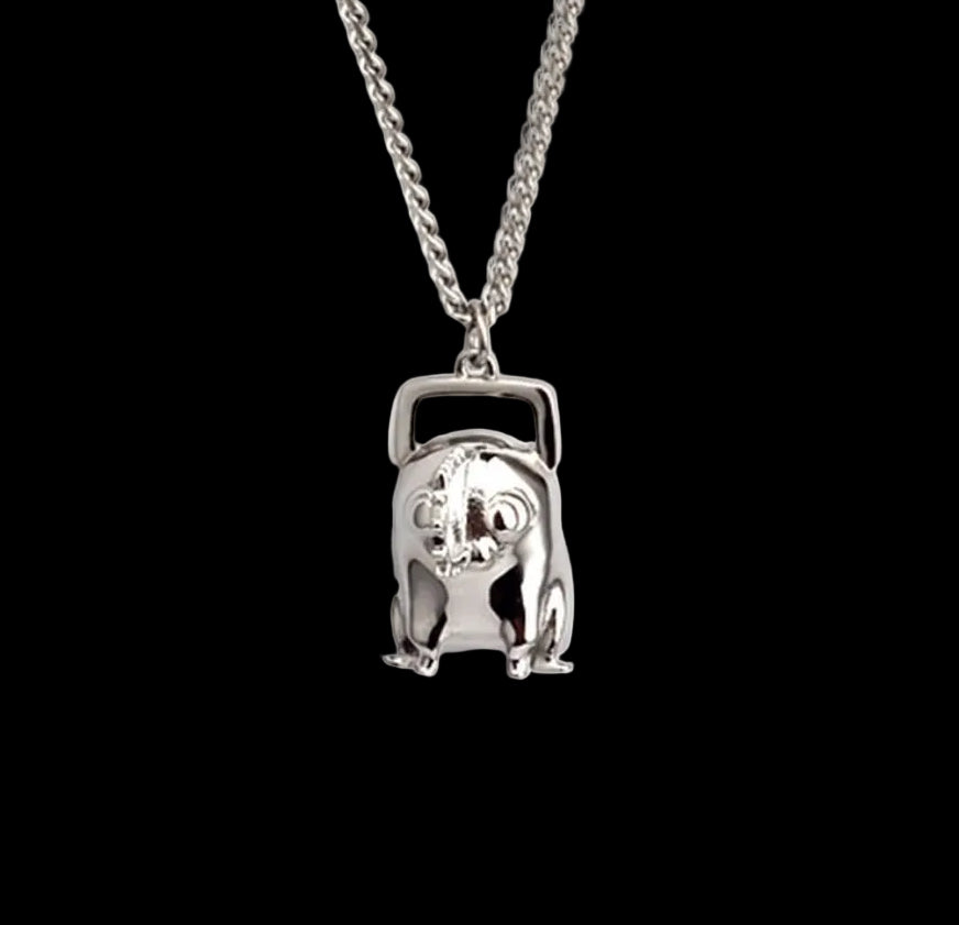 Chainsaw dawg necklace.