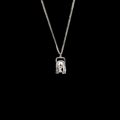 Chainsaw dawg necklace.