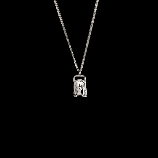 Chainsaw dawg necklace.